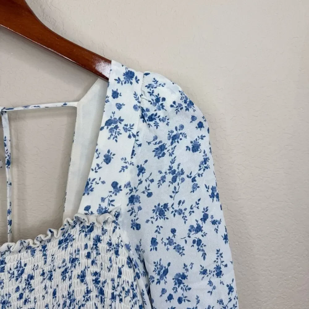 REFORMATION Braelyn Top Blue White Smocked Floral Pull On Spring Women’s Sz L